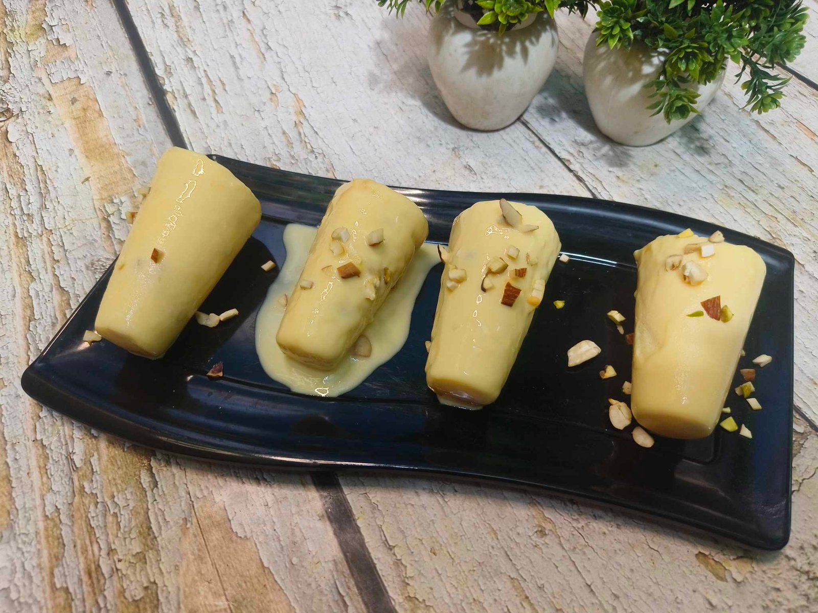 কুলফি: বাদামের ফ্লেবারে কুলফি মালাই